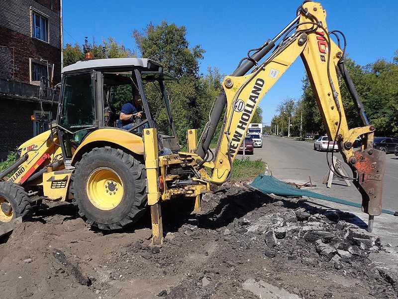 Аренда гидромолота. Услуги экскаватора-погрузчика с отбойником.